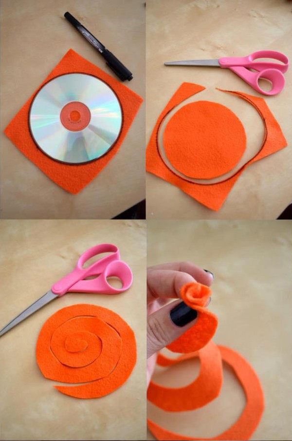 Đặt đĩa CD/DVD và vẽ theo vòng tròn của sau đó bạn cắt miếng vải theo đường tròn vừa vẽ Sau đó bạn cắt theo hình xoắn ốc.
Cuối cùng bạn cuộn từ trong ra ngoài cho đến hết. như vậy bạn đã được một bông hoa hồng rồi. bạn có thể dùng để trang trí trong nhà hoặc vòng hoa.... Chúc các bạn thành công