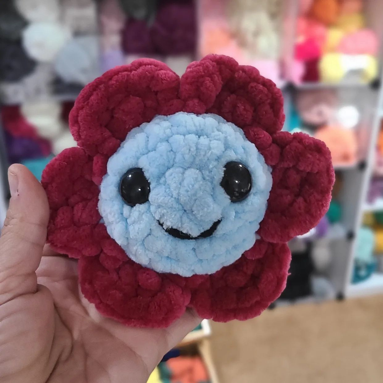 crochet flowers behind the wings