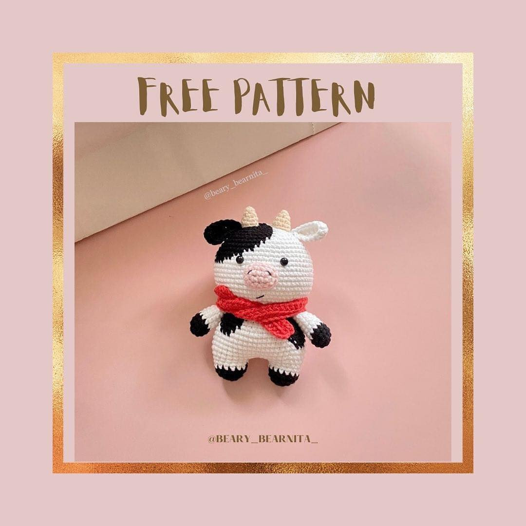 crochet pattern dairy cow wrapped in red scarf.