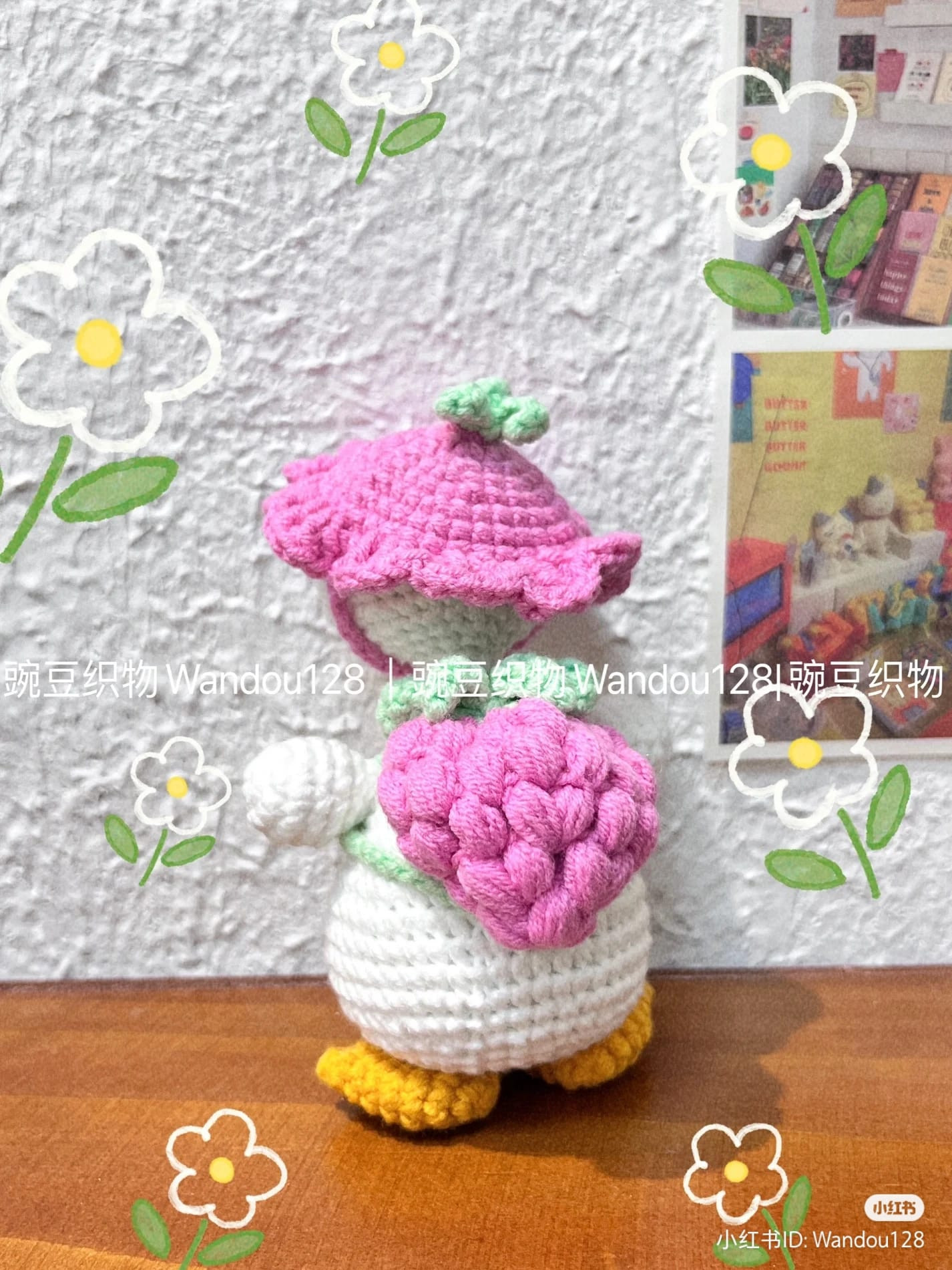 crochet pattern duck wearing a raspberry backpack.