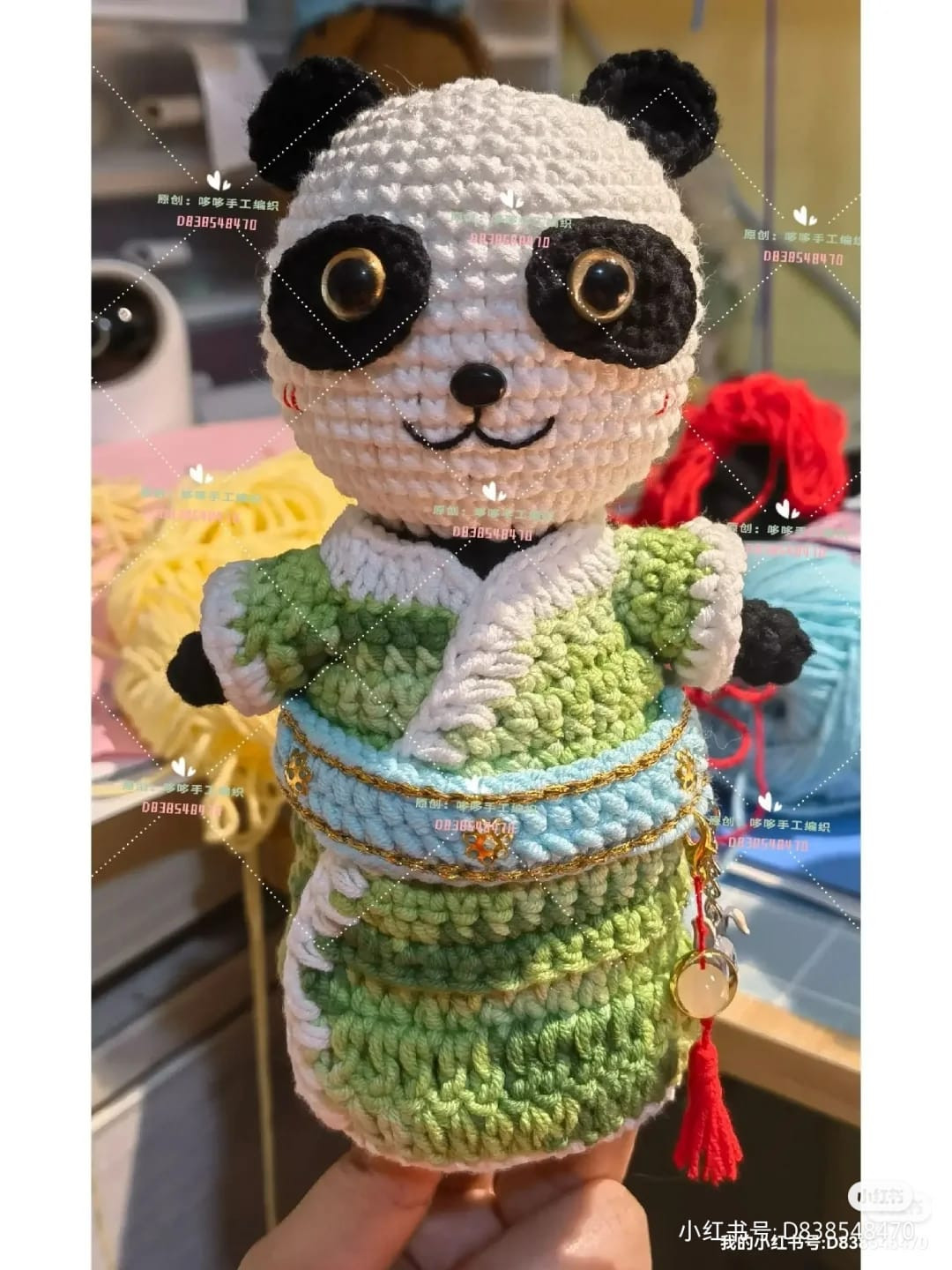 crochet pattern panda wearing blue dress.