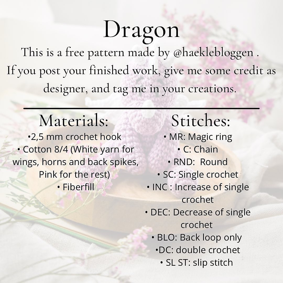 free crochet pattern pink dragon, white horns.