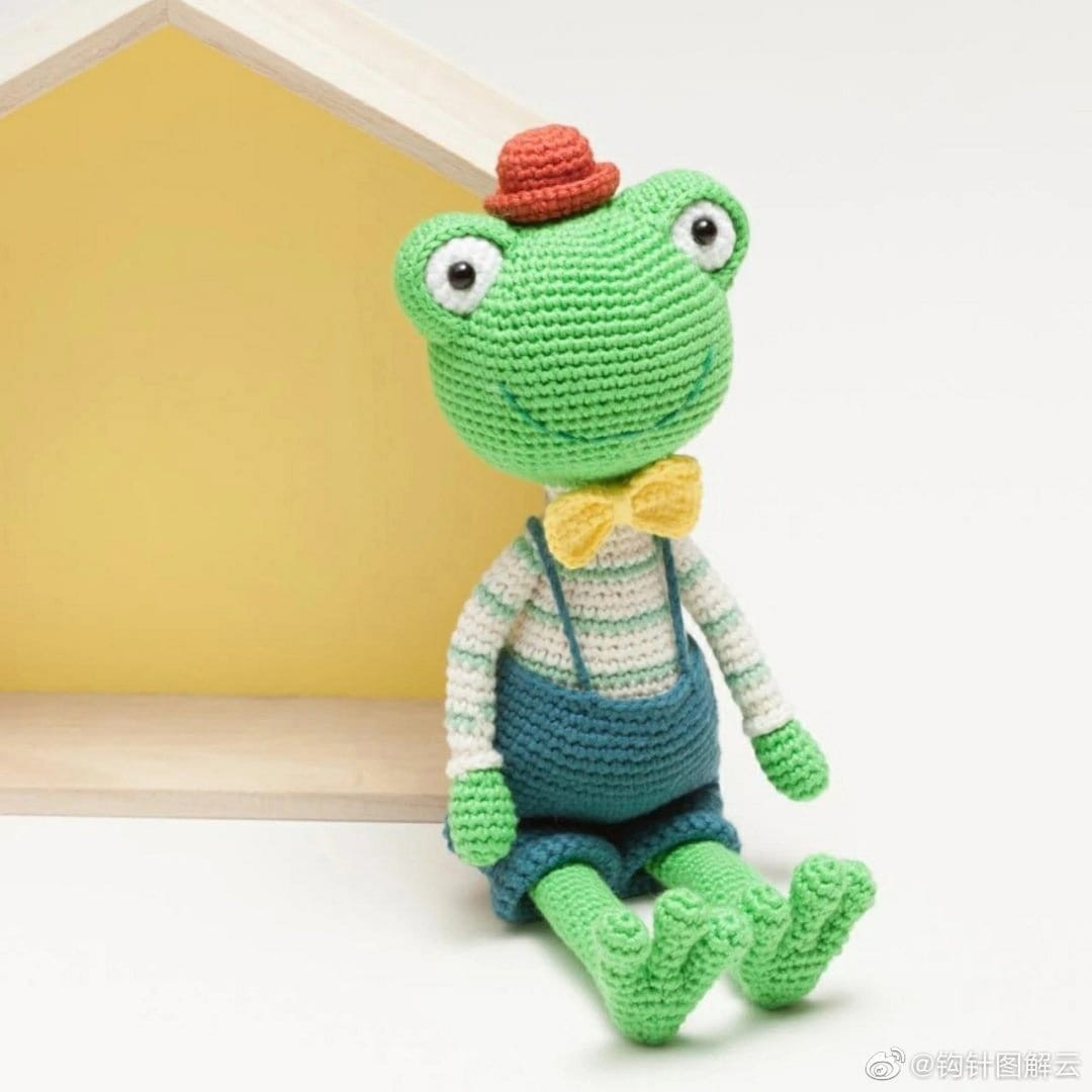 green frog wearing overalls crochet pattern