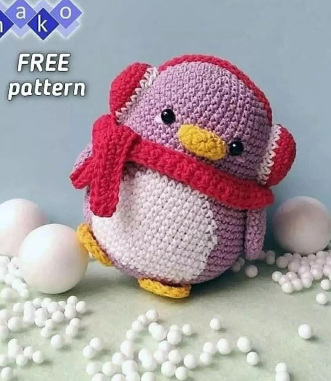 Penguin crochet pattern wearing red headphones