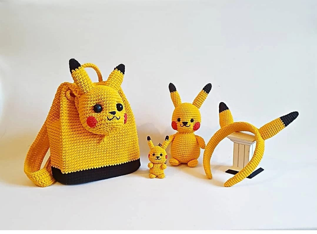 Pikachu wearing navy crochet pattern