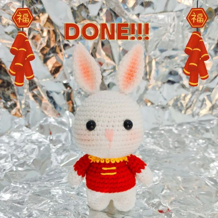 Pink-eared rabbit crochet pattern, wearing a red shirt.