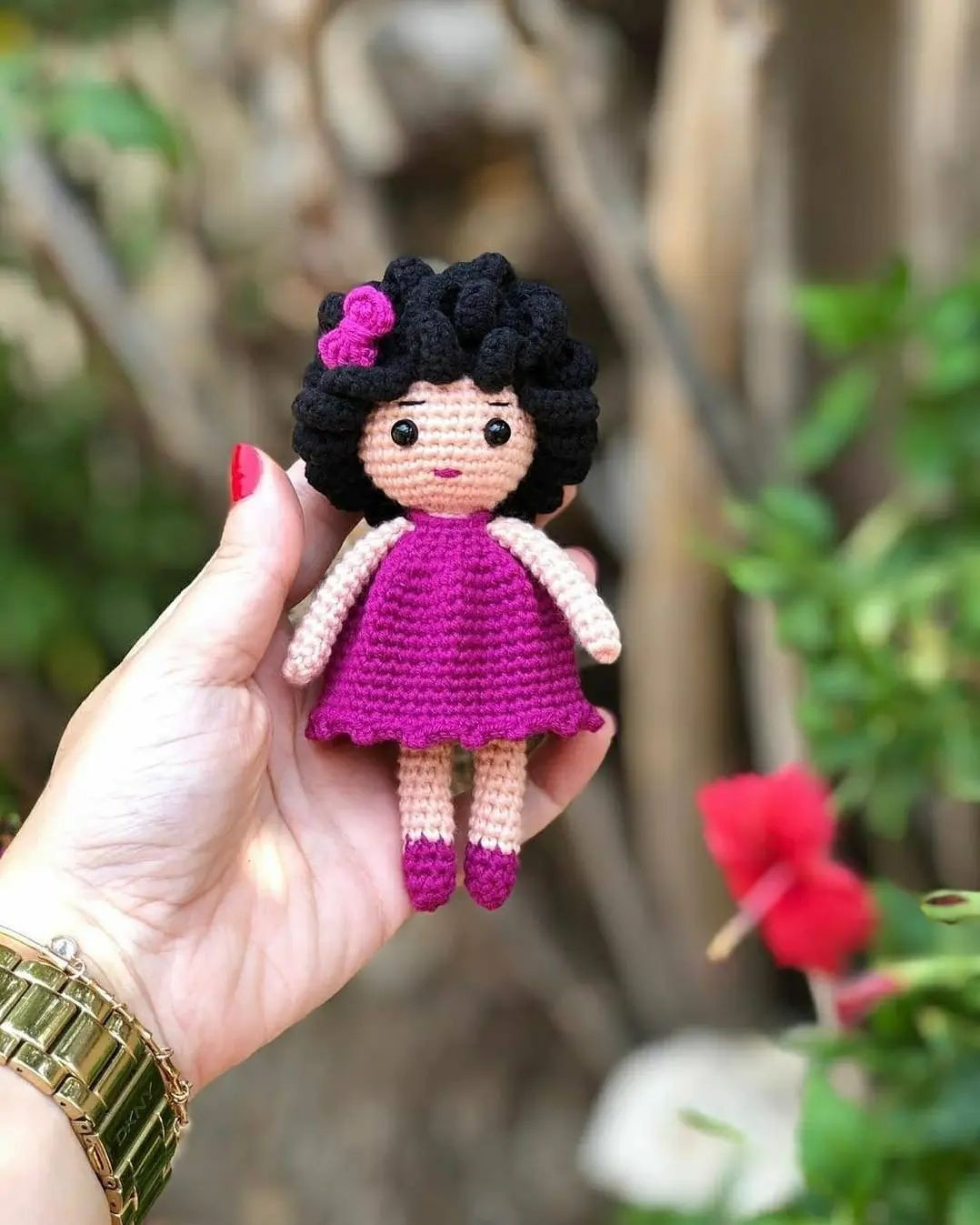 free crochet pattern black haired doll wearing pink dress