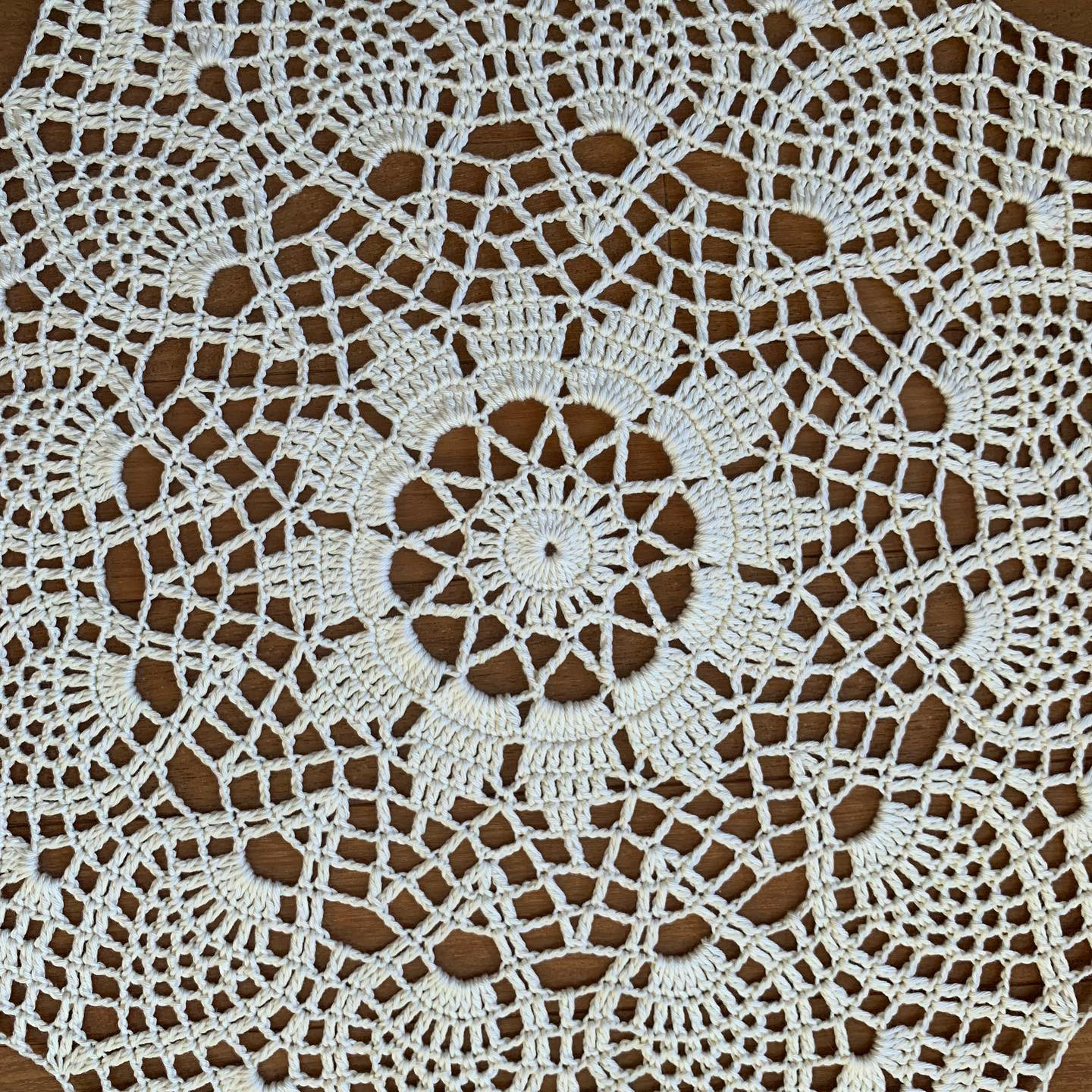free crochet pattern circle with twelve spikes in the center with a circle