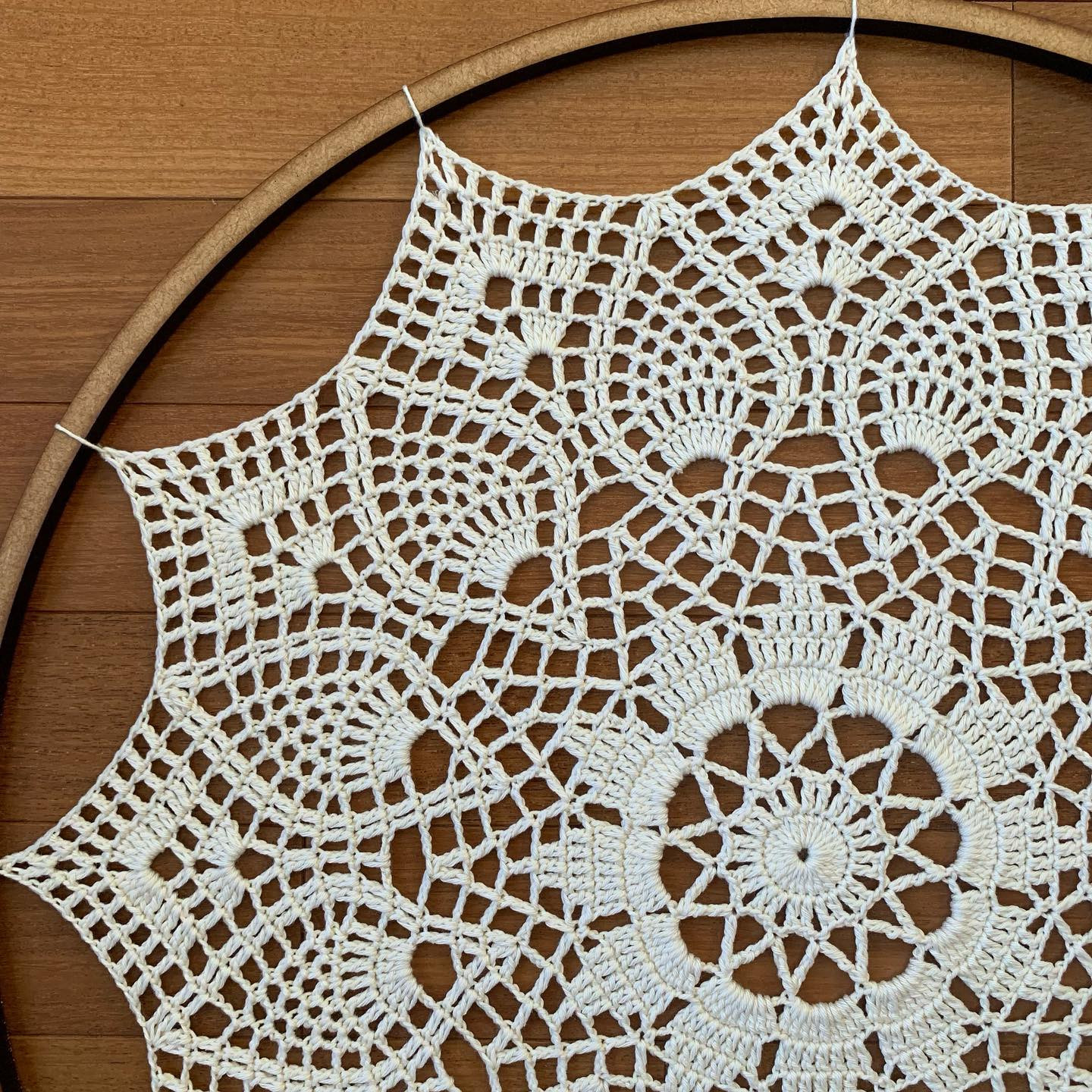 free crochet pattern circle with twelve spikes in the center with a circle