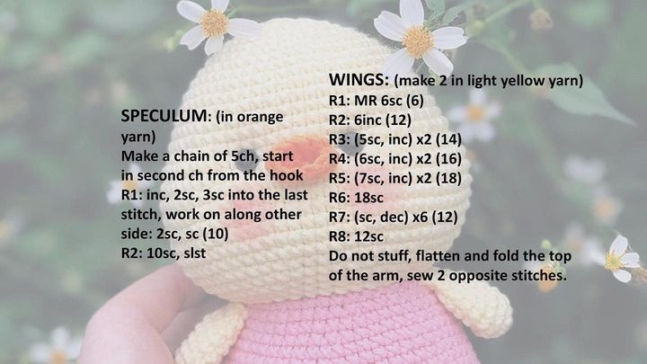 free crochet pattern duckling wearing pink dress.