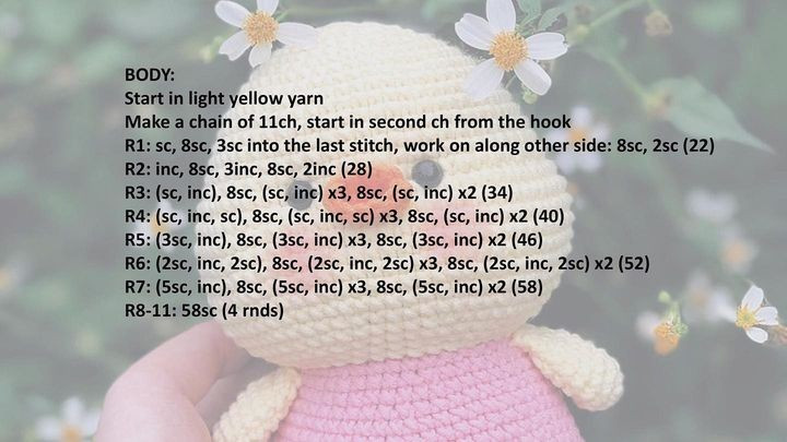 free crochet pattern duckling wearing pink dress.