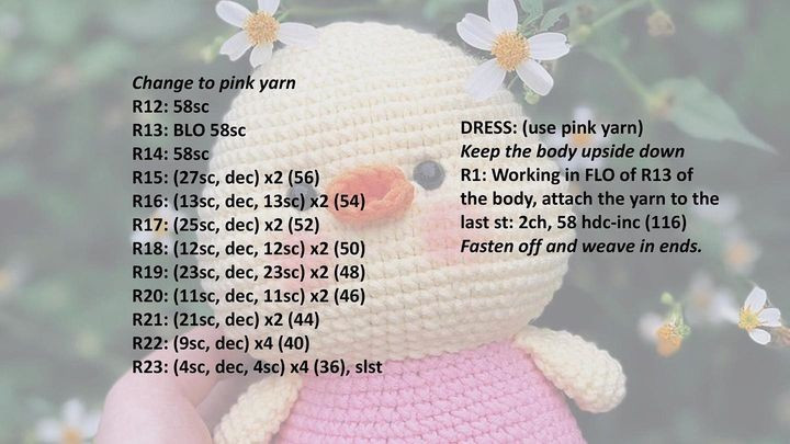 free crochet pattern duckling wearing pink dress.