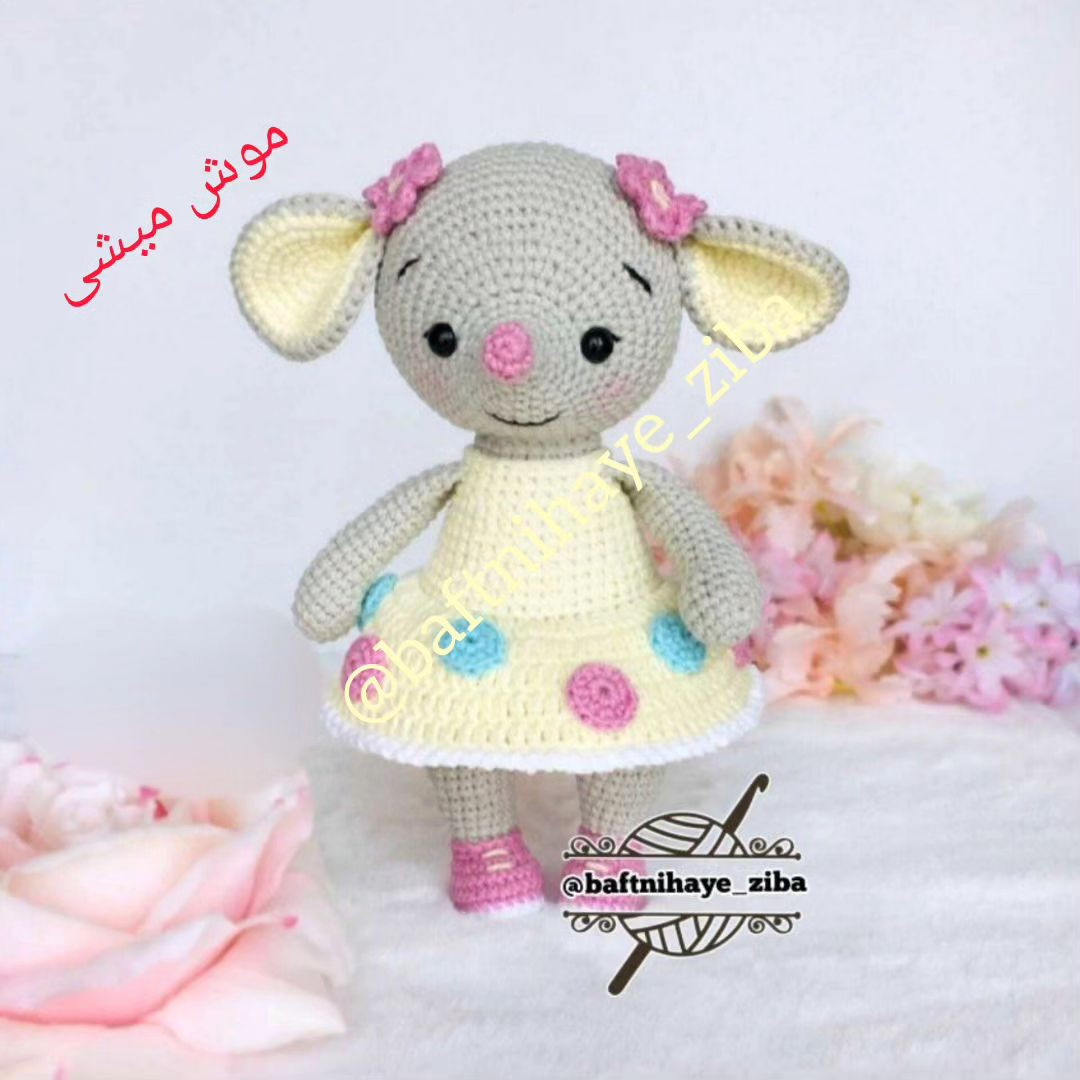 gray rat with pink flower white pistil wearing yellow dress crochet pattern
