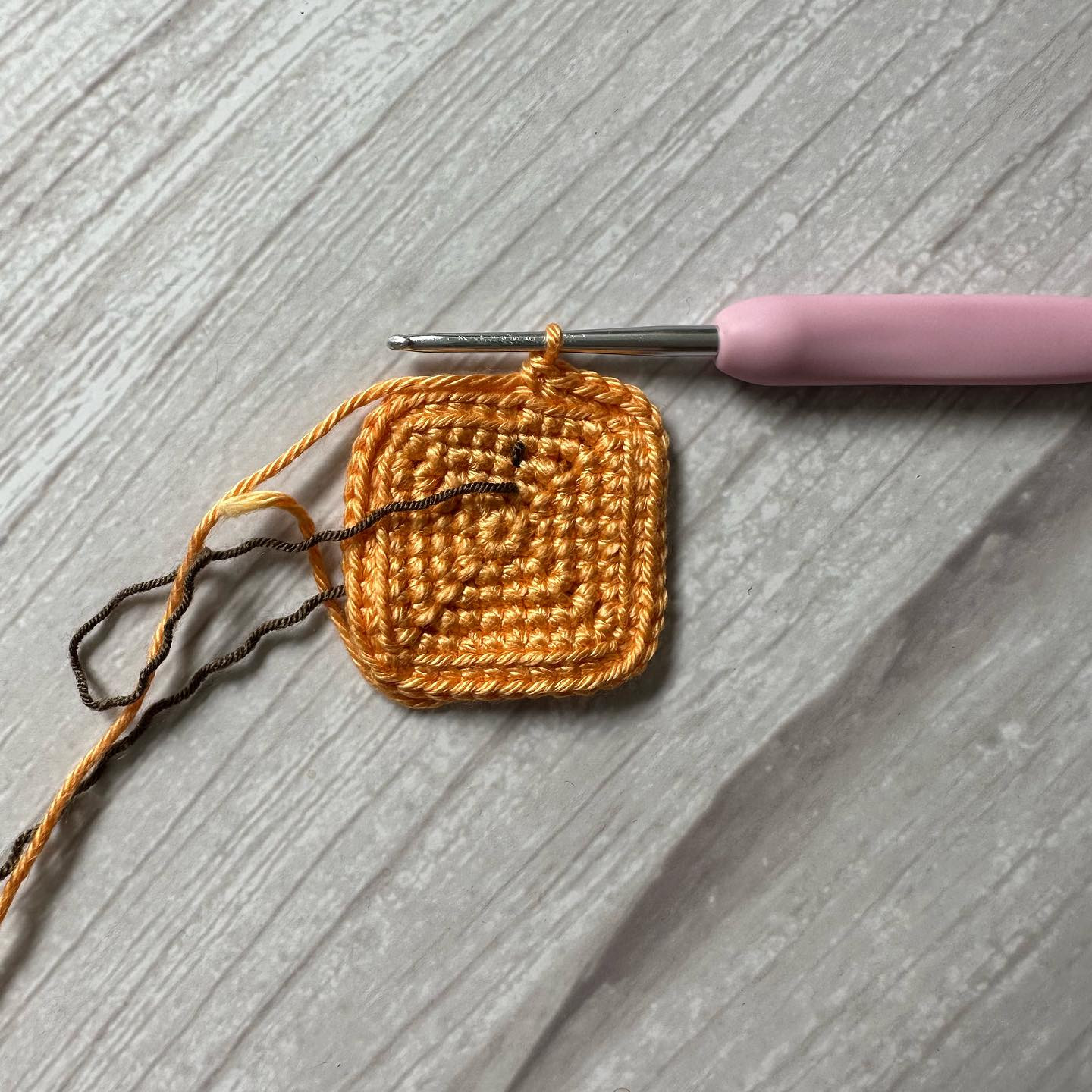 mini orange handbag, blue crochet pattern