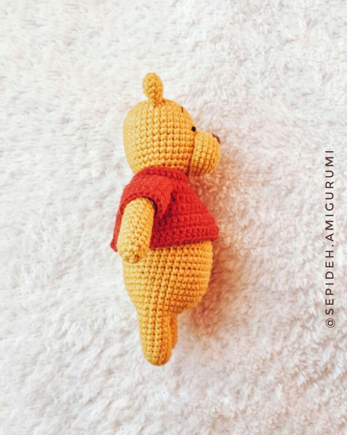 yellow bear pooh, wearing red shirt, red heart crochet pattern