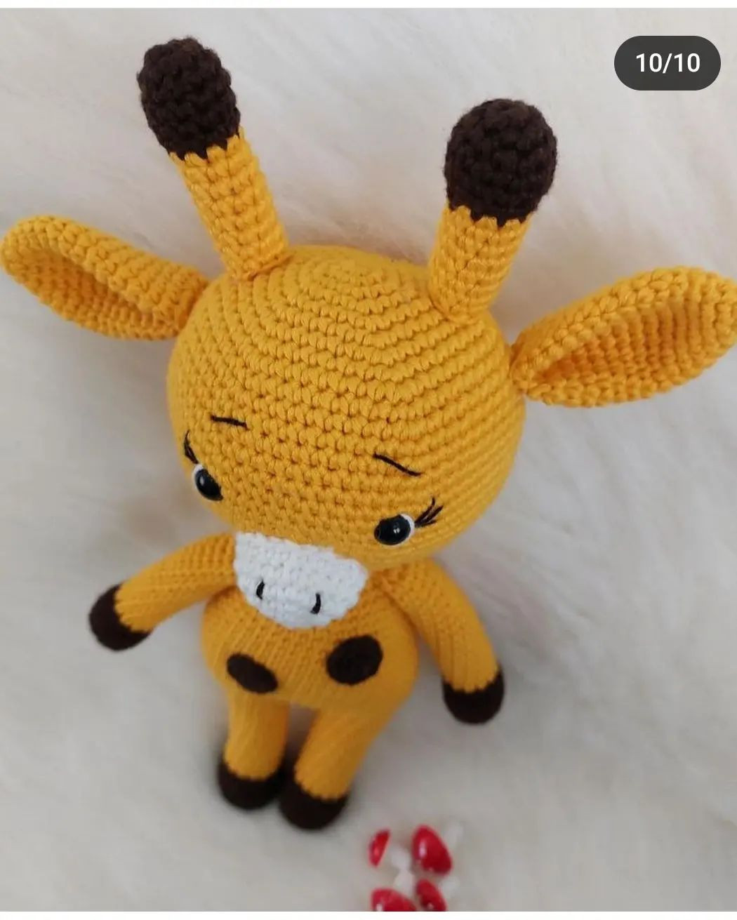 yellow deer, white muzzle, brown spots.free crochet pattern