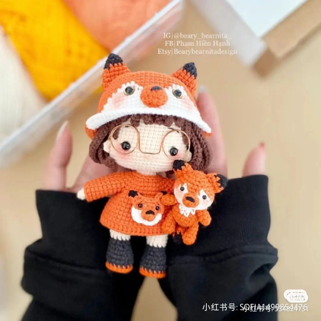 The doll wears a fox outfit, crochet pattern