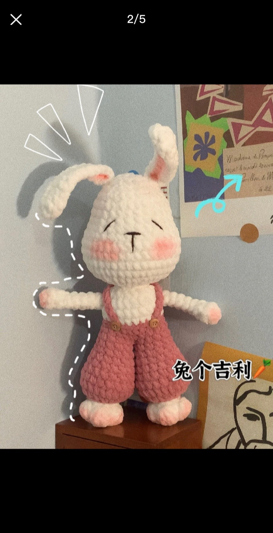 White rabbit wearing crochet pattern overalls