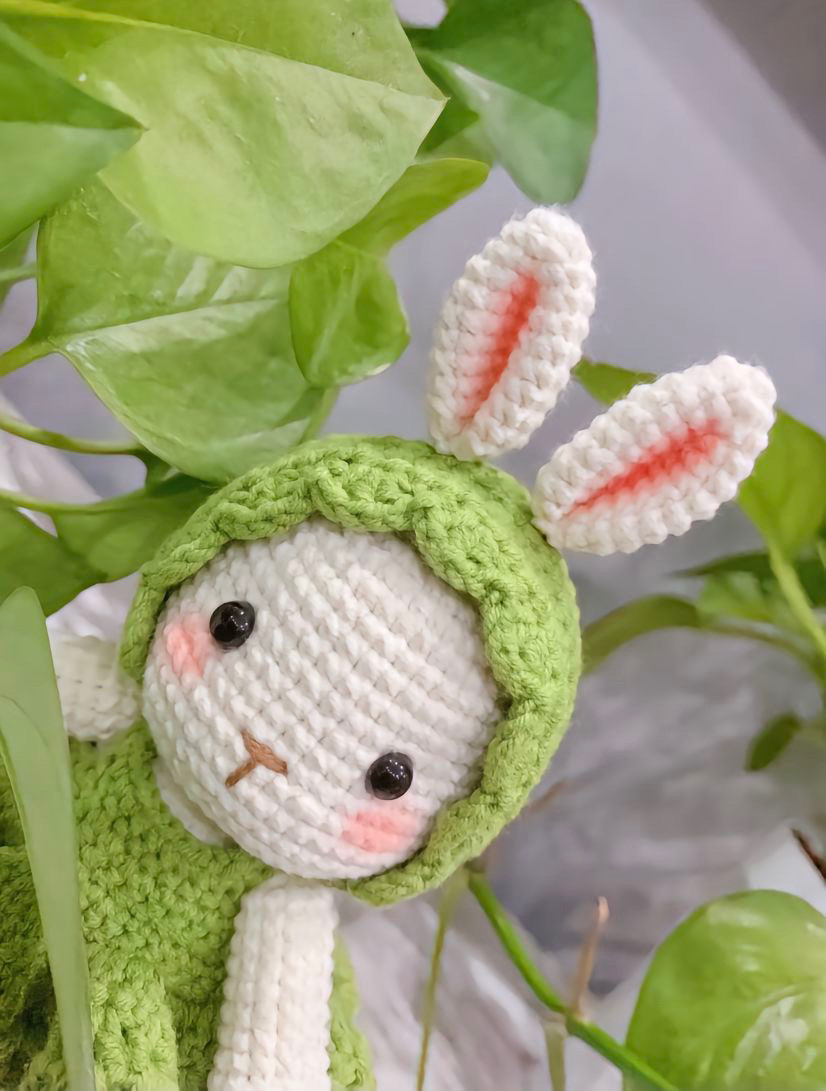 White rabbit wearing green dress, crochet pattern