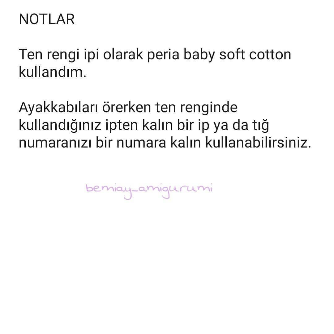 Kızıl saçlı, mavi elbiseli ve mavi tavşan kulaklı bir bebek için tığ işi modeli