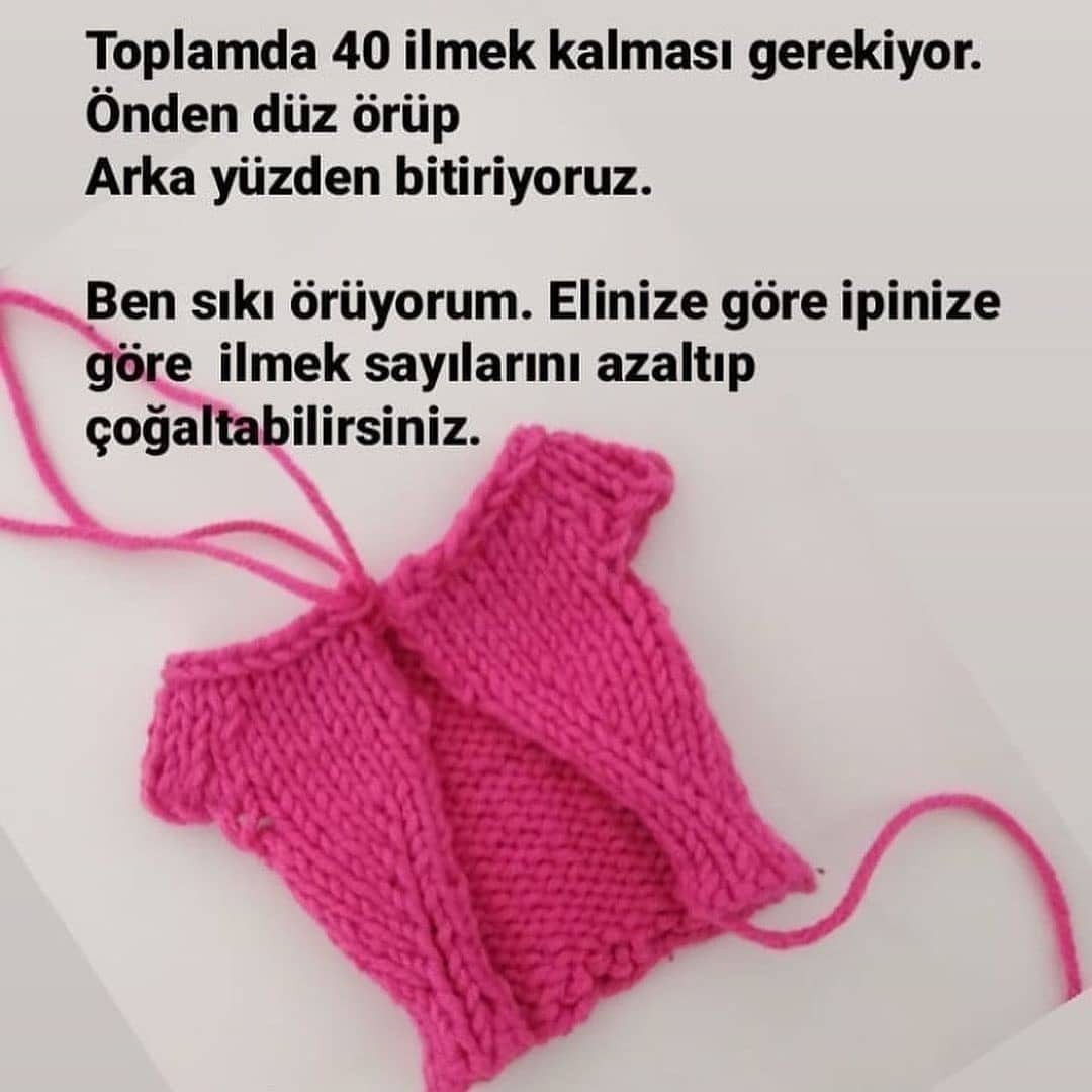 Pembe bebek elbisesi tığ işi modeli.