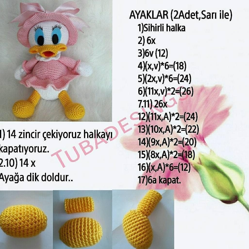 Pembe elbise, pembe şapka, sarı gaga ve ayak giyen ördek tığ işi modeli.