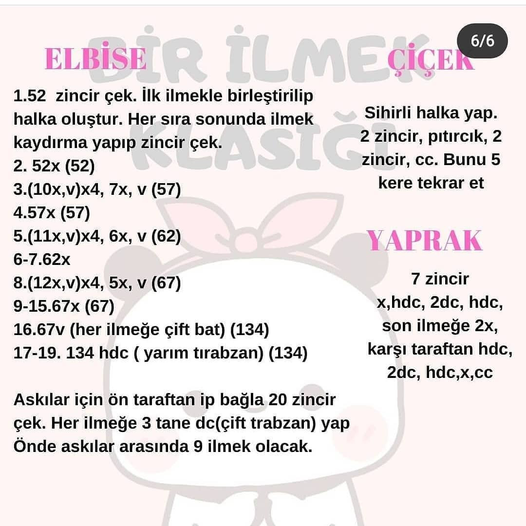 Pembe ve beyaz bir elbise giyen tilki bebeği için tığ işi modeli.