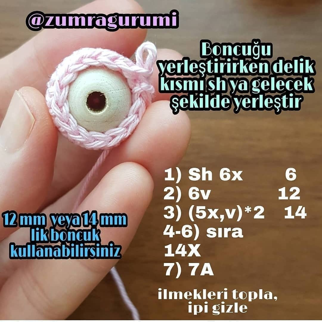 siyah benekli inek çıngırak, pembe namlu, emzik için tığ işi modeli.