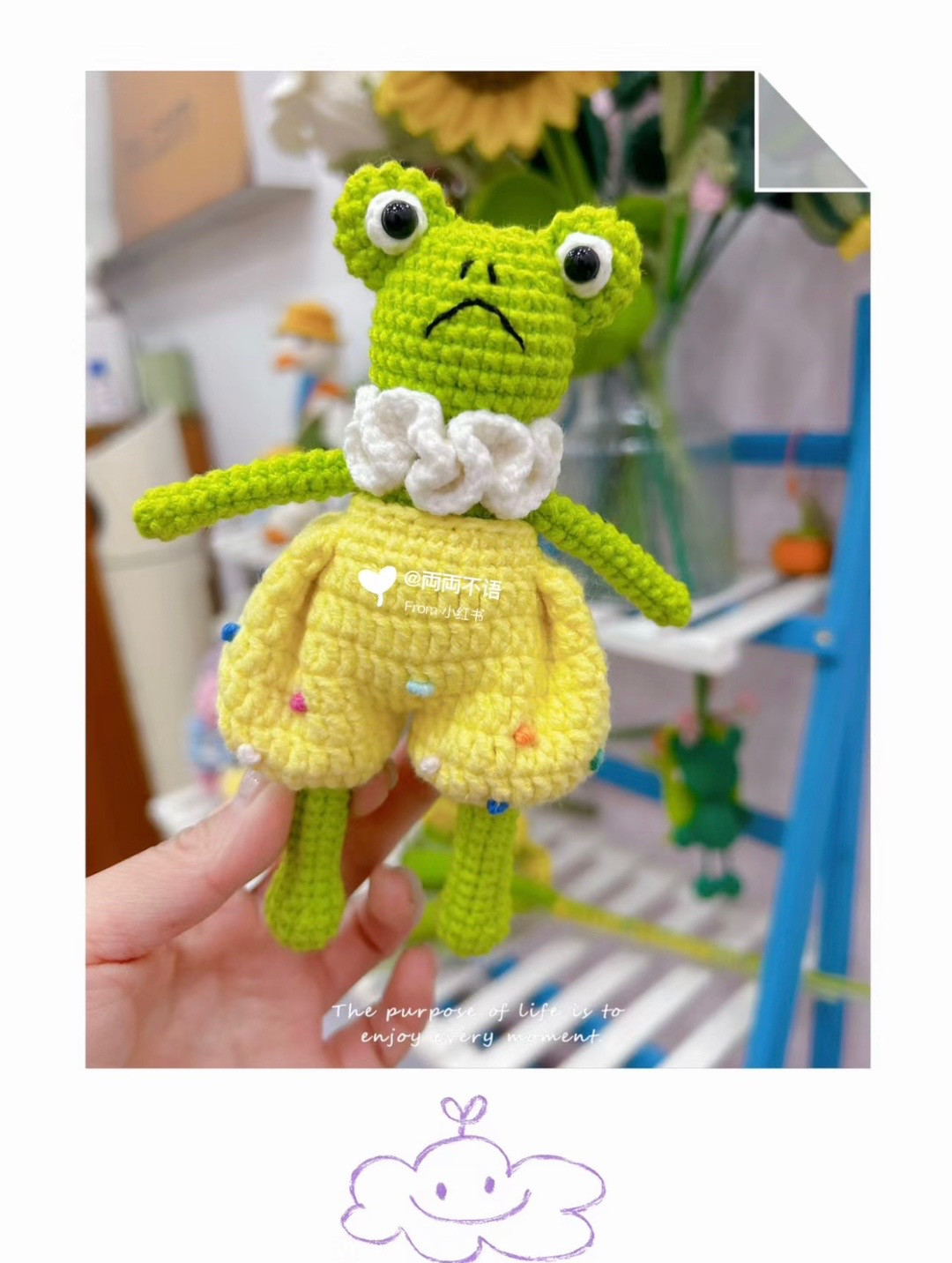 Crochet pattern of green frog with bulging eyes, wearing yellow pants.
