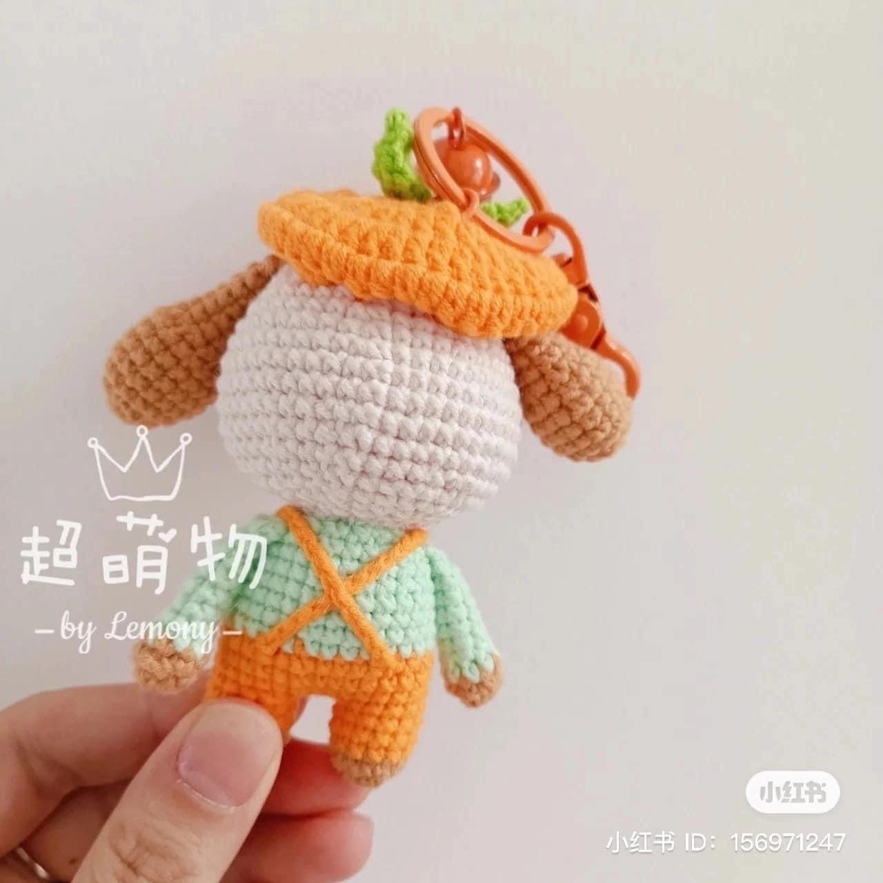 Crochet pattern for a dog wearing a pumpkin hat and overalls.