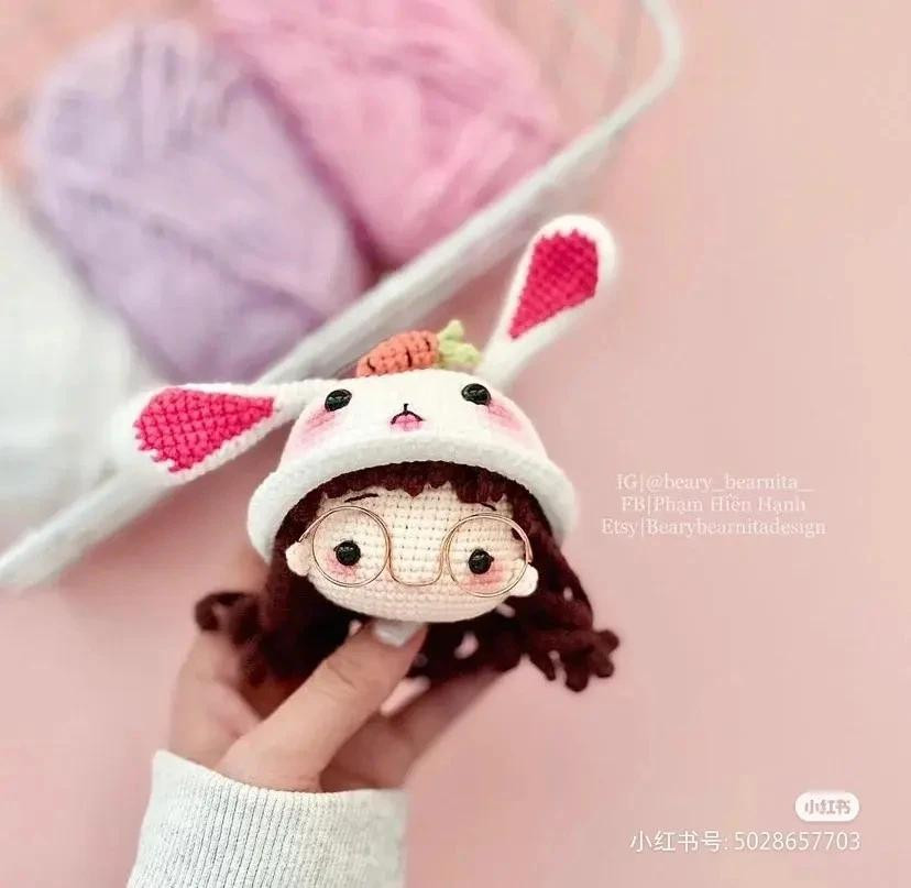 Crochet pattern for a doll wearing a bunny outfit