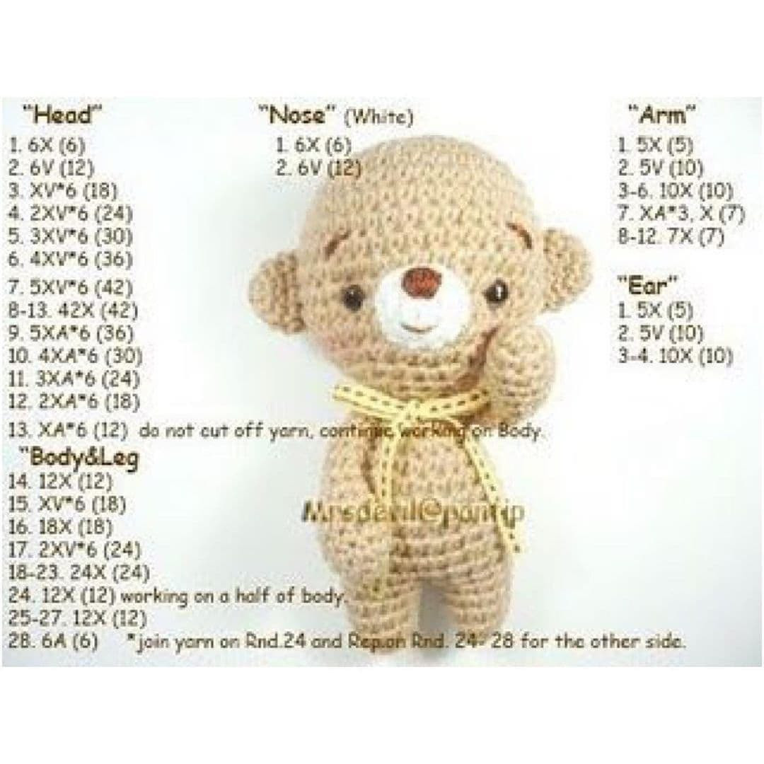 Crochet pattern of brown bear wrapped in scarf, white muzzle