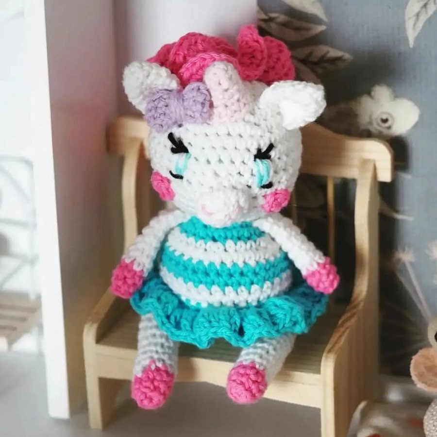 Unicorn crochet pattern wearing a dress