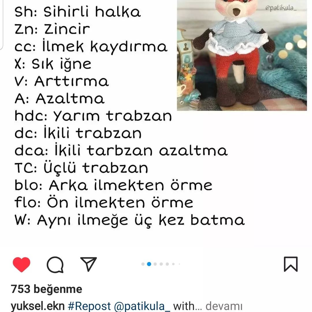 Etek ve fiyonklu kravat takan tilki tığ işi modeli.