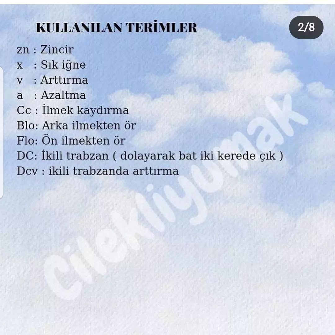 Mor elbise giyen ayı bebek için tığ işi modeli