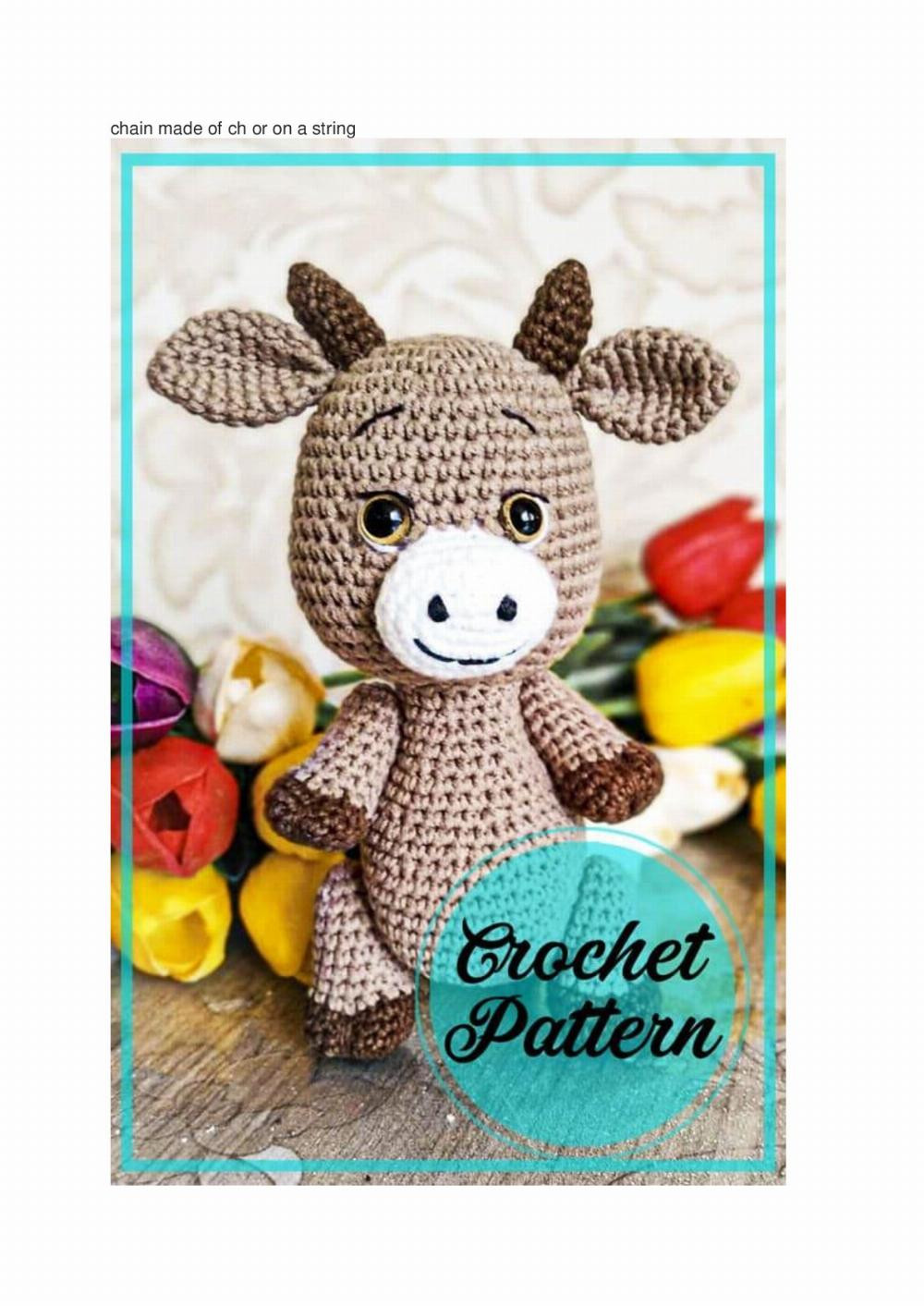 Crochet pattern for a cow wearing a bell