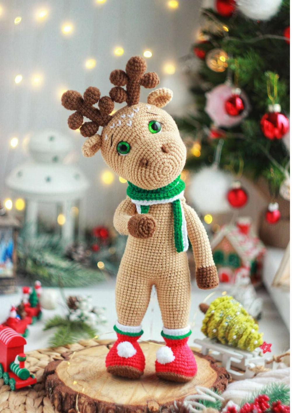 Crochet pattern of a deer wearing clothes and a scarf