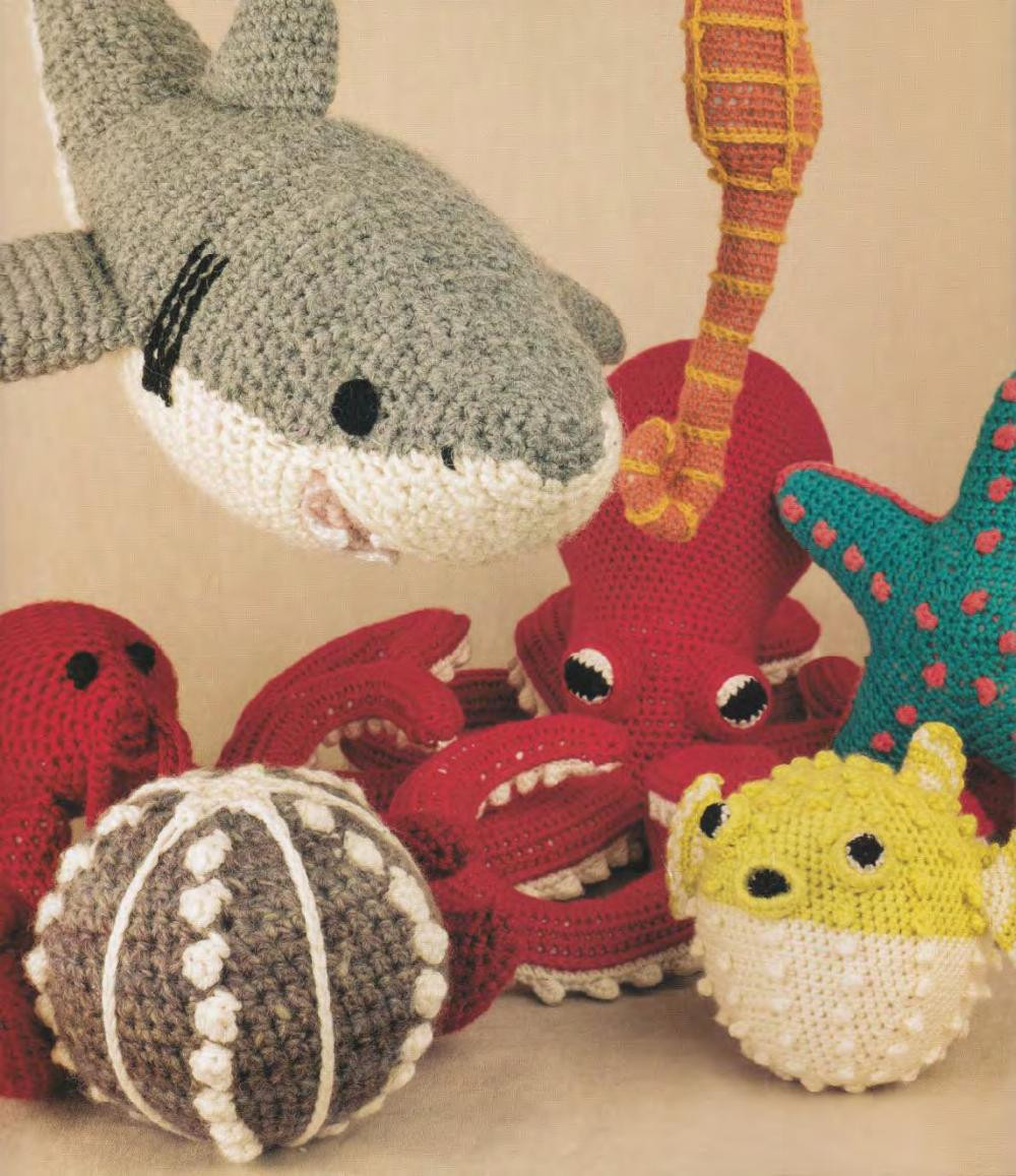 crocheted sea creatures A collection, starfish, whale, jelly fish, shark, puffer fish,  lobster, sea urchin, hermit crab, seahorse, octopus, angler fish, nautilus,