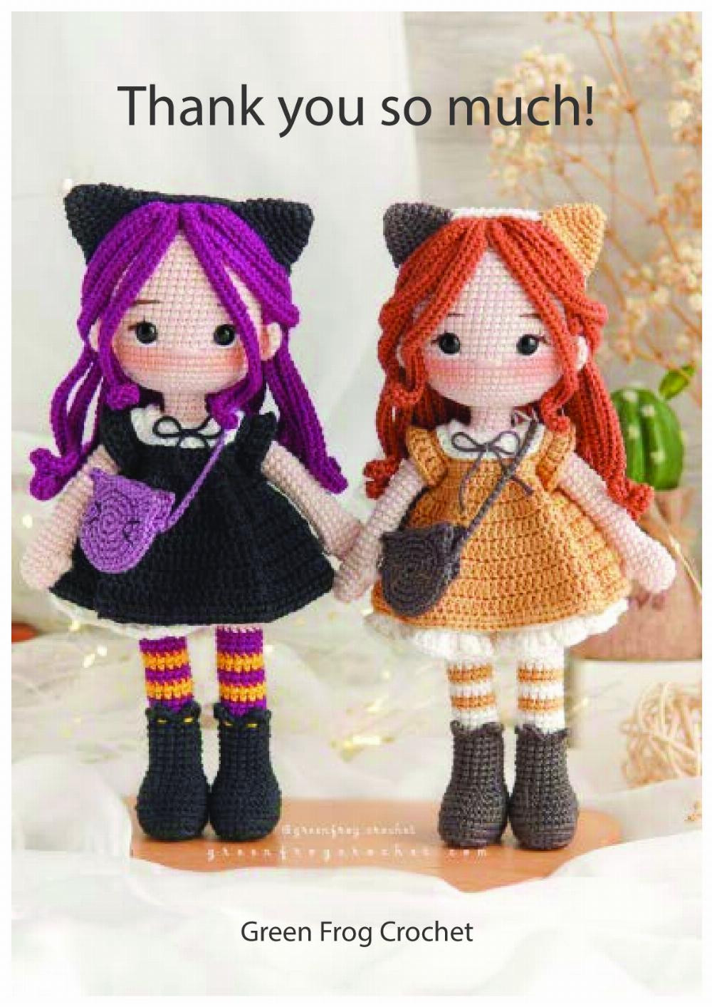 Doll Katy,  Girl crochet model wearing orange and black clothes, orange and black hair, carrying a crossbody bag and cat ears