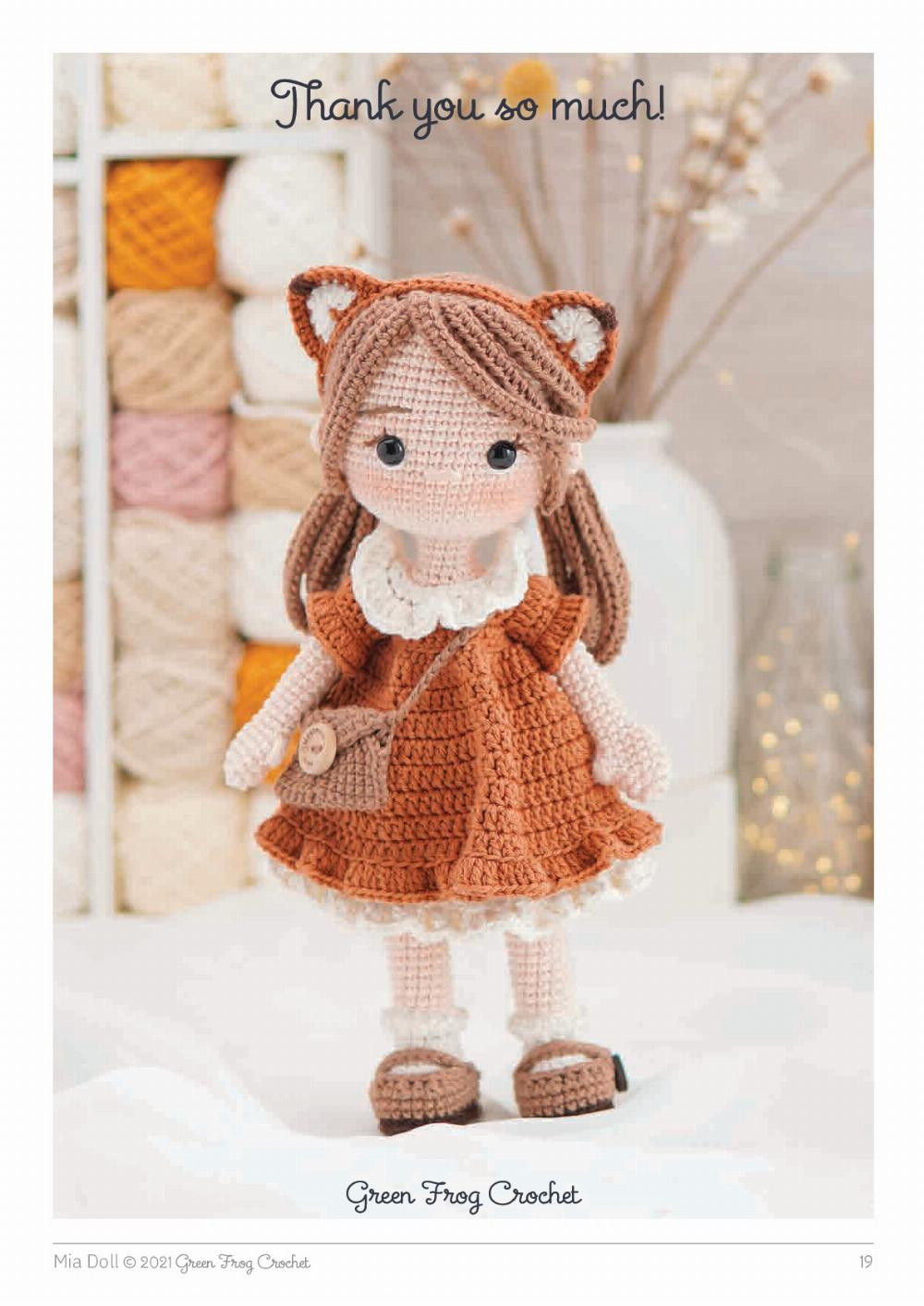 Mia Doll , Crochet pattern for a little girl with brown hair and a brown dress