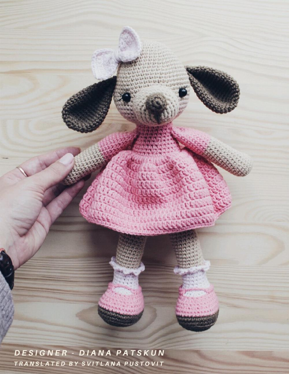 BABY EVA, Crochet pattern for a dog doll wearing a hip-colored dress and a white bow