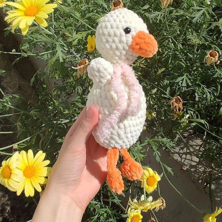 Crochet pattern for a white duck with an orange bill