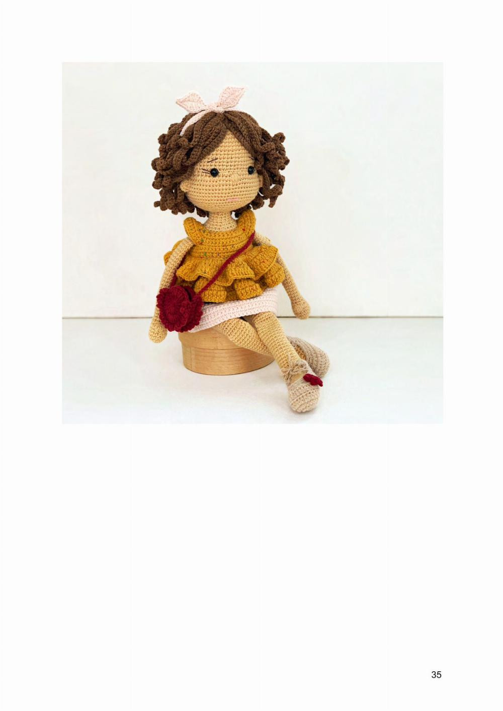 GISELLE DOLL, Crochet pattern of girl wearing a yellow dress, red crossbody bag, black hair