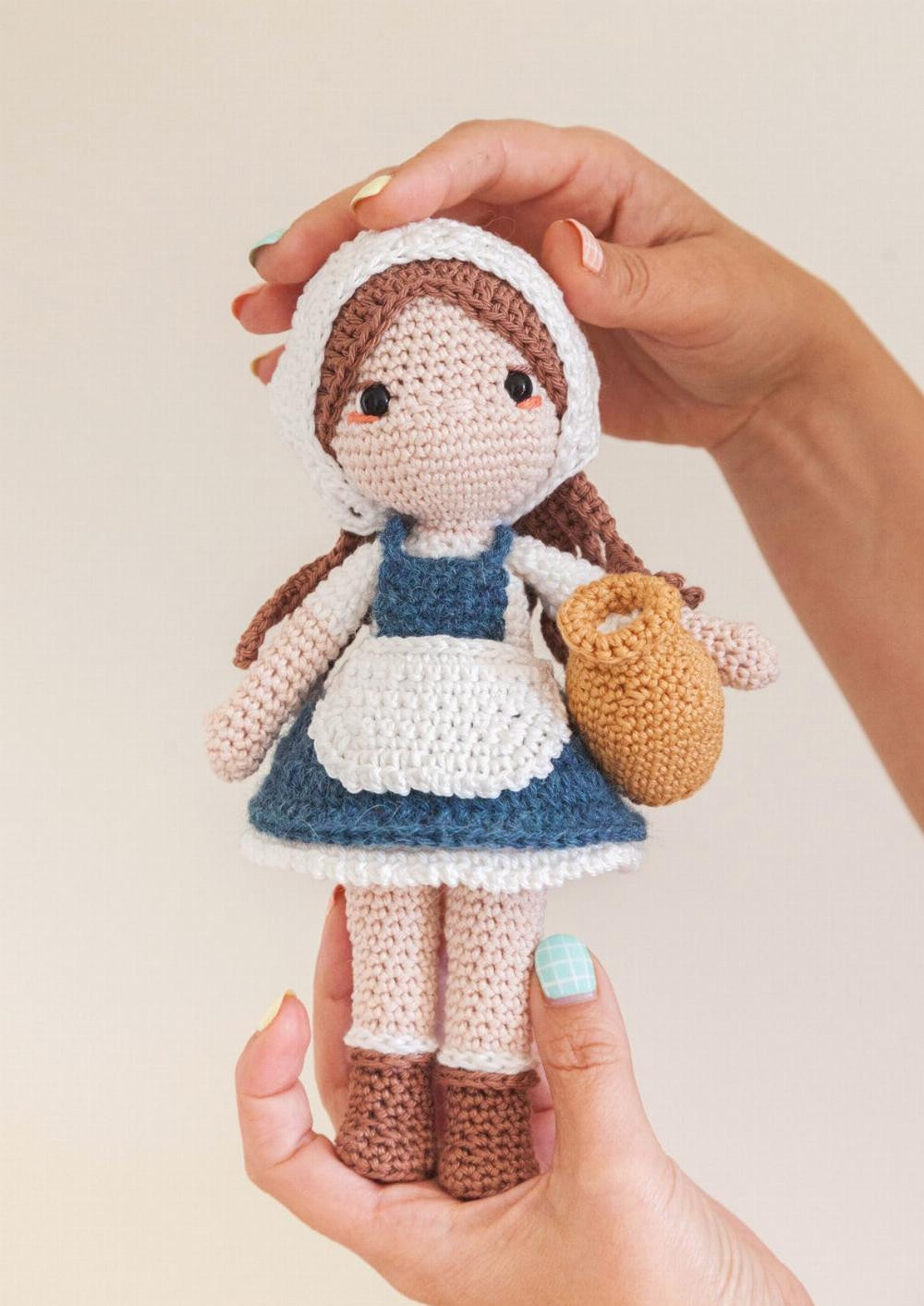 The Milkmaid, crochet pattern for a little girl doll wearing an apron