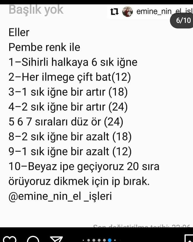 Balon tutan pembe bir elbise giyen beyaz tavşan tığ işi modeli.