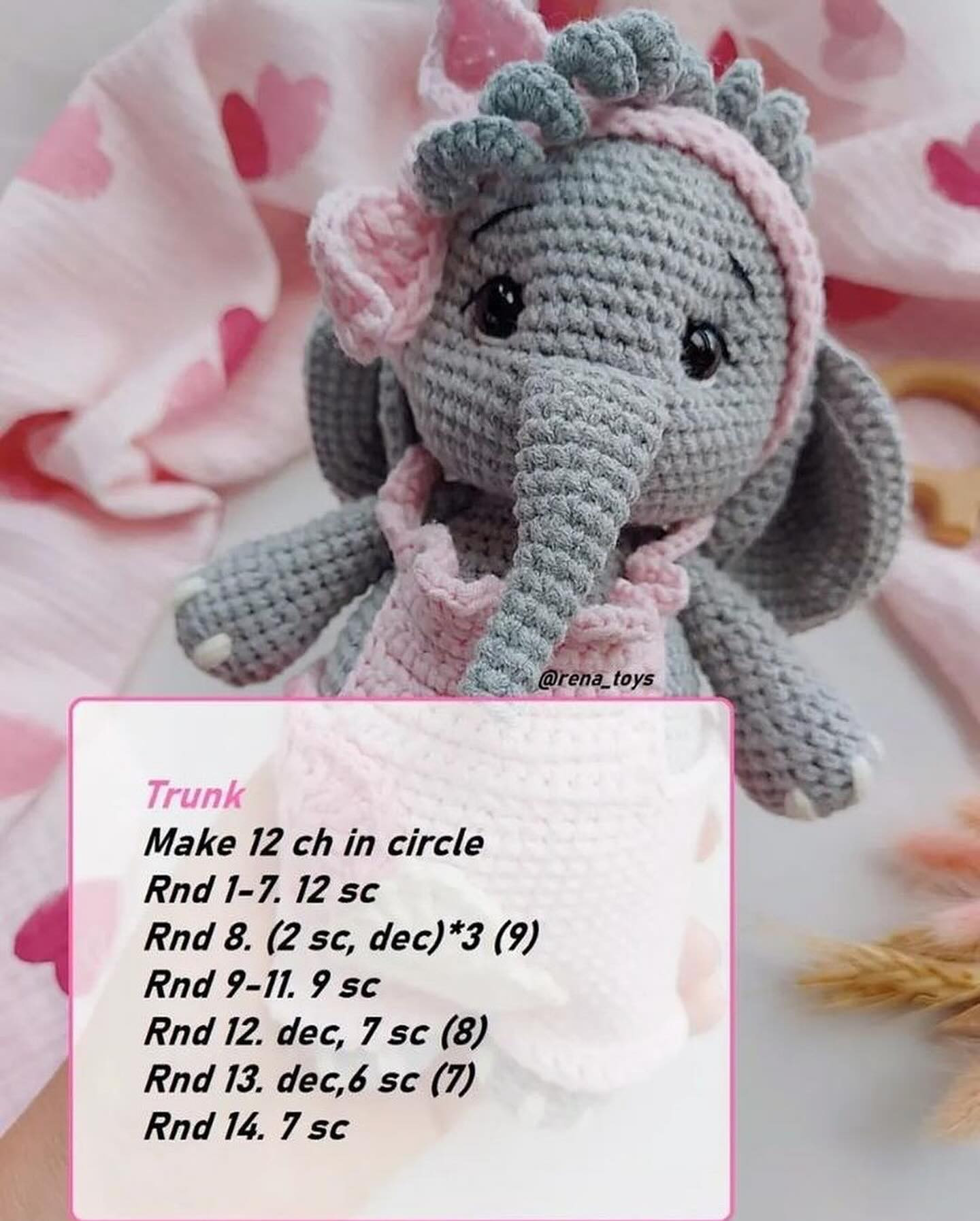 Gray elephant crochet pattern wearing pink dress