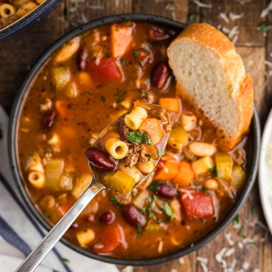 Pasta e Fagioli Soup is an Olive Garden copycat recipe and an Italian favorite. Loaded with beans, ground beef, and tiny noodles, this soup is so comforting, and it's made all in one pot!⁠