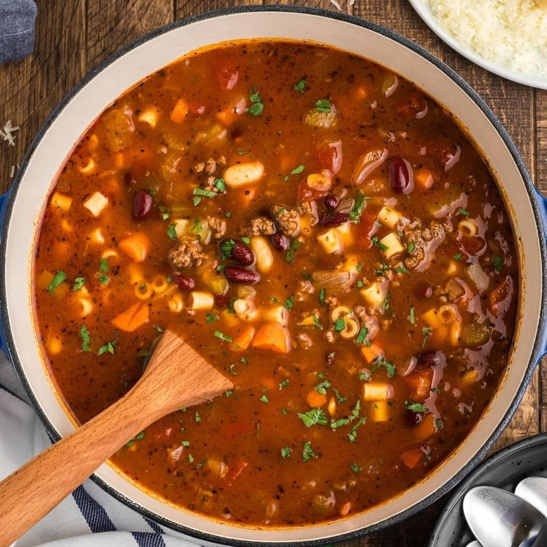 Pasta e Fagioli Soup is an Olive Garden copycat recipe and an Italian favorite. Loaded with beans, ground beef, and tiny noodles, this soup is so comforting, and it's made all in one pot!⁠