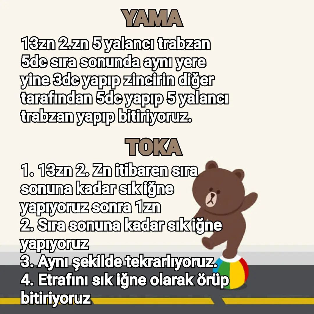 Pembe elbise giyen bir köpeğin tığ işi modeli.