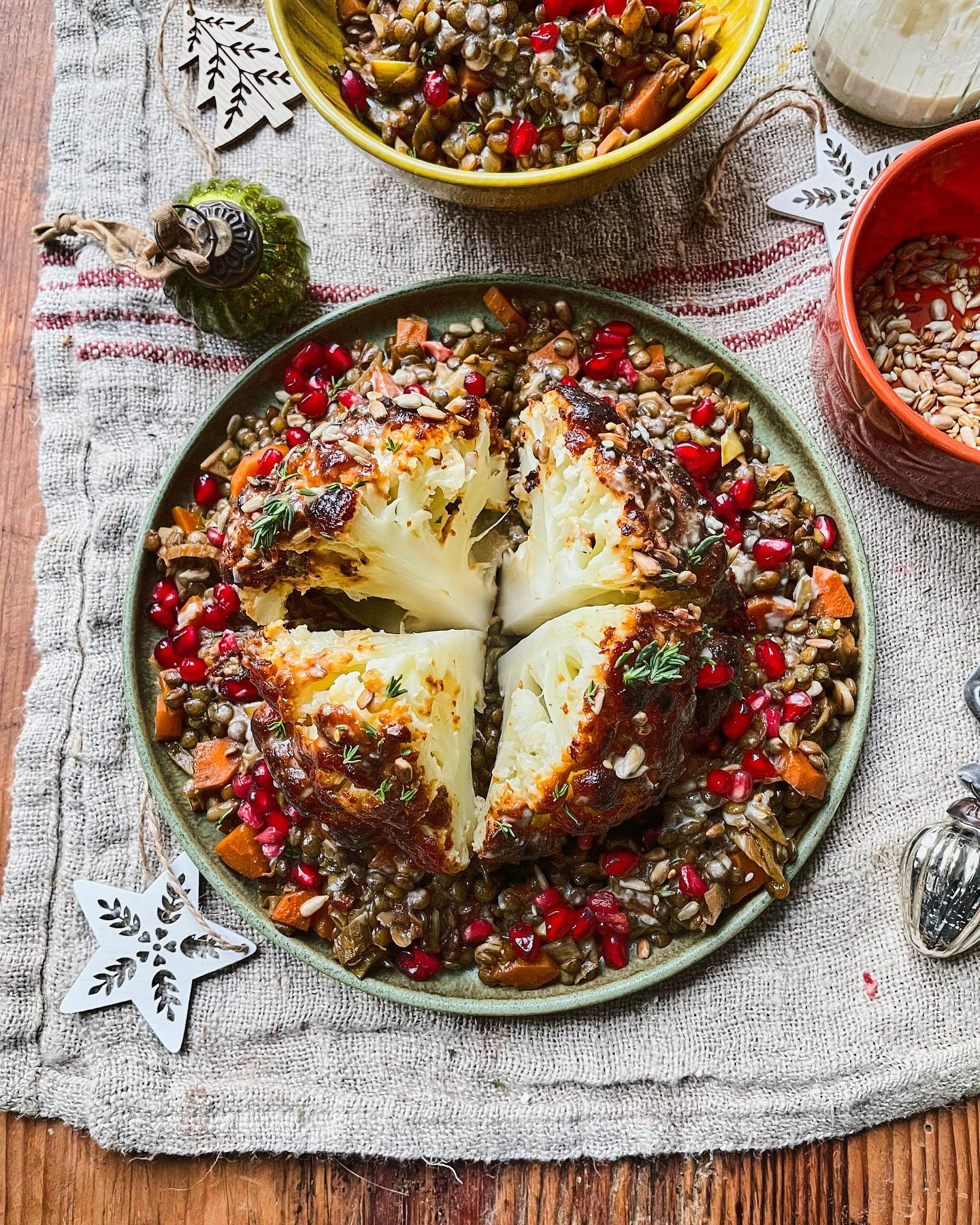 Served on a bed of earthy, super tasty puy lentils then topped with creamy tahini dressing and little pops of gem like pomegranate seeds for an extra festive feel.